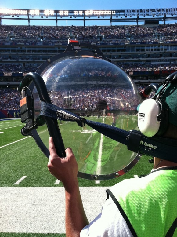 A parabolic microphone op records QB candence at a NY Giants football game